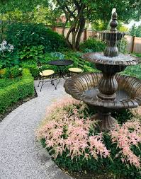 Each basin edged in decoratvie scalloped grooves.it's suits for luxury with vividly hand carved swan in the pool surround of the marble fountain, two flower carved water basin is supported by 10 sprial columns. All About Garden Fountains This Old House