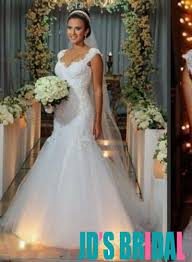 A mermaid wedding dress is a favorite choice for brides. H1669 Sexy Sheer Open Back Lace Mermaid Wedding Dress 2016