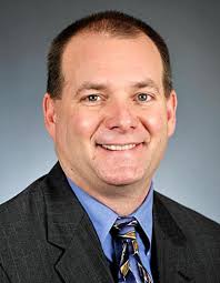 Woodard campaigning in new territory against Wolf