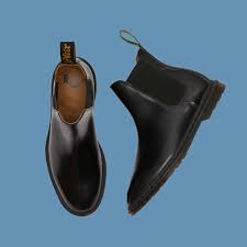For the ladies, you can instantly make that pretty floral summer dress a reminiscent nod to wear them with dark blue jeans and a flannel shirt wrapped around your waist. Doc Martens S Chelsea Boot Is The Shoe I Wear With Jeans Shorts And Suits Conde Nast Traveler