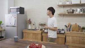 Some objects can be dangerous. A Man In The Kitchen Stock Footage Video 100 Royalty Free 1035351362 Shutterstock
