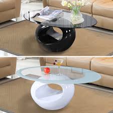 The oval tabletop is available in different finishes so you can find a table that best fits your style. High Gloss Black White Oval Glass Stylish Coffee Table Living Room Furniture Black White