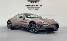 Image result for Marron Black 2017 Aston Martin