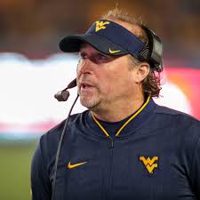 I just came across some info that WVU is finalizing a deal with Josh Lynn  to be the next Football HC.