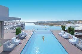 Located at d'en bossa beach, its 415 luxury rooms and suites are filled with unique experiences. The Best New Ibiza Hotels We Can T Wait To Check Into Ibiza Spotlight