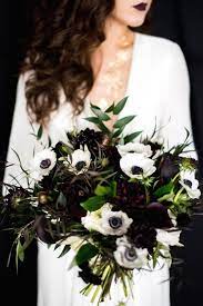 Find more color palette ideas at burghbrides.com. Anemone Wedding Bouquet With Deep Eggplant Flowers My Deer Flowers