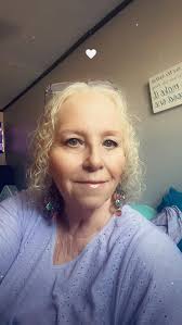 What hairstyle would suit a 68-year-old woman with thinning hair?