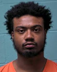 A woman suspected of dealing narcotics at an area convenience store where  she was employed was arrested Thursday