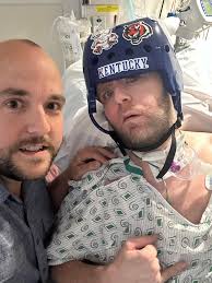 Hanging with my little bro today! Daniel is making so much progress. Thank  you all for the continued prayers. He is able to respond to some commands  and count with his fingers.