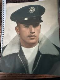 Does anyone know this man or his family? His name is Harvey Gooden  according to the back of the photo. He sent it to my mother in 1966. I  found it while