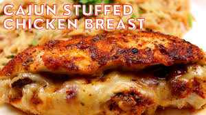Place in a well greased (i suggest butter) baking dish and top with spices. Moist And Delicious Cajun Stuffed Chicken Breast Juicy Youtube
