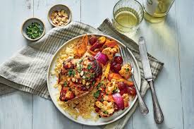 Sweet And Spicy Sheet Pan Chicken With Cauliflower And Carrots Recipe Recipe Sheet Pan Suppers Carrot Recipes Pan Chicken