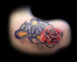 Tattoos on this particular part of the rear are very popular that. Full Color Rose And Iris With Lace And Beads By Justin Hicks Tattoonow