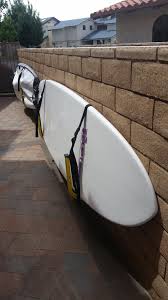 Store Your Paddleboard Outside To Save Space In Your Garage Home Outdoorstorage Supstorage Wallrack Sto Wall Racks Garage Storage Solutions Garage Storage