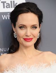 Angelina Jolie 42 Says She Loves Seeing Herself Get Older It Means I M Alive Angelina Jolie Blonde Angelina Jolie Hair Wedding Hair Inspiration