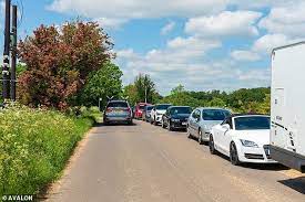 Jeremy clarkson inside the cab of an excavator in clarkson's farm. Krispadcag89hm