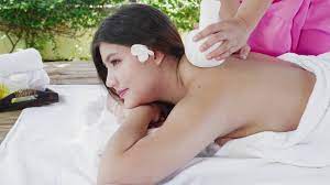 Beautiful Asian woman enjoying body massage at spa and massage at hotel  8836860 Stock Video at Vecteezy
