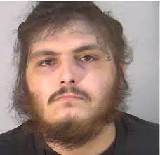 Felon with gun arrested after cops ID him by facial tattoo