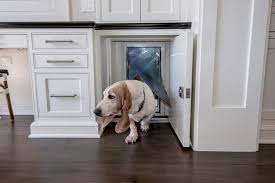 Make Way For Doggy With This Kitchen Doggy Door Fitted Behind A Lockable White Dog Spaces Dog Houses Dog Door