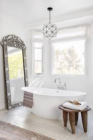 Comprised of thirty crystal clear large glass bubbles surrounded by a host of our smaller bubbles, the 45 bubble chandelier is perfect for a space that deserves light and levity on a grand scale. 41 Bathrooms With Mirrors Above Bathtubs Shelterness