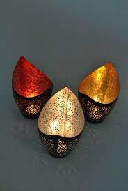 Tea Light Holder Oval Black Metal Tealight Candle Holder Silver Or Copper Colour Leaf Four Seasons Liverpool Tealight Candle Holders Candle Holders Tea Lights