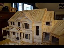 The basic house is complete with a roof, windows, a chimney. How To Build A Popsicle Stick House Youtube