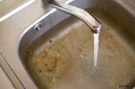 stainless steel sink plug hole close up