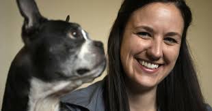Young veterinarian Lindsey Rewinkel specializes in acupuncture, house calls  for cats, dogs