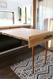 Table parts are connected by piano hinges. Space Saving Diy Expandable Table Mountainmodernlife Com Diy Space Saving Diy Expandable Table Space Saving Furniture