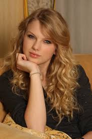 You can see such an example by looking at this photo of a cute girl posing for the camera with her curly hair and blue eyes. Taylor Swift Women Blonde Curly Hair Blue Eyes Hd Wallpapers Desktop And Mobile Images Photos