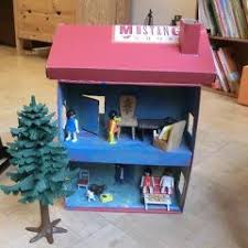 Puppenhaus Aus Schuhkarton Basteln Im Kidsweb De Karton Basteln Schuhkarton Puppenhaus