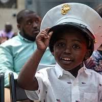 Mamoro-Kun and Senior Airman John Linzmeier, 18th Wing