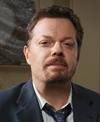 Eddie Izzard as Wayne Malloy