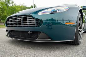 Image result for Hardly Green 2012 Aston Martin