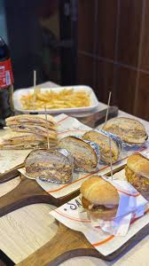 ATTENTION PLEASE , @sallys_burgers introduce their ramadan deals from which  i tried their DEAL 5 , Includes any 5 items from their menu ,  Burger/wrap/sandwich , Also they have launched their new fries ...