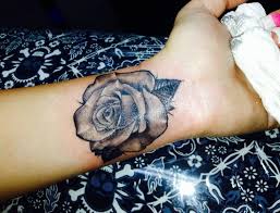 Most people like it because the rose appears to be gothic. Realistic Rose Tattoo On Wrist Inner Arm Inner Wrist Tattoos Rose Tattoos On Wrist Wrist Tattoos For Guys