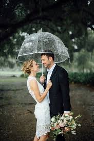 Rainy Day Wedding Photo Idea Clear Umbrella Wedding Photo Gabby Chapin Country Wedding Photography Wedding Photography And Videography Bride And Groom Photo