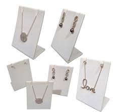 Maybe you would like to learn more about one of these? Amazon Com 6 Pack White Leatherette Pendant Chain Necklace Display Stand 3 5 Tall Leaning Earring Stand Jewelry Display Home Kitchen