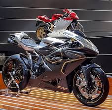 The f4 was created by motorcycle designer massimo tamburini at crc (cagiva research center), following his work on the ducati 916. The First The Last The Mv Agusta F4 Cc Claudio Castiglioni The Last F4 Only 100 Units To Be Produced For The World Market For Bilstein