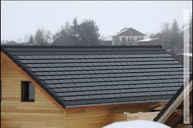Des Tuiles Photovoltaiques Performantes Et Esthetiques Alpha Solaire D Imerys Toiture Pour Cette Maison A Ossatu Maison Ossature Bois Tuiles Solaires Toiture