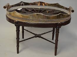 • a mirror tray or a silver tray is a sophisticated way to serve treats to guests. Sold Price Butler S Tray Coffee Table With Removeable Shaped Silver Plate Tray With Faux Tortoise Starburst Design And Rolled Handles Sitting In Bamboo Motif Oval Stand With X Stretcher Base Base Has Damage