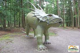 Visit The Ancient Past At Dinosaur Gardens In Ossineke Michigan Michigan Adventures Dinosaur Garden Fossil Hunting