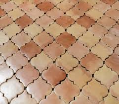 Terracotta translates from italian as baked earth, and as a category of ceramic tile, it refers to tiles created from a particularly porous and easily shaped clay with a high iron content that gives the tiles their characteristic reddish/brown color. 7 875 X 8 75 Sealed Arabesque Picket Regular Saltillo Square Edges Floor Tile Saltillo Tile Kitchen Terracotta Tiles Bathroom Saltillo Tile