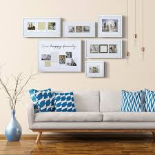 For a new take on the gallery wall, mount three inexpensive wood pieces with pretty brackets to your wall. Brayden Studio 6 Piece Cottingham One Happy Family Gallery Wall Picture Frame Set Reviews