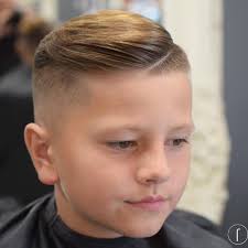 The extra hair will allow your child to style a number of different styles, including the ivy league haircut with side swept hair in the front, a textured crop top, or short spikes. Pin On Boys Fade Haircuts