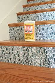 Remodelaholic Colorful Stairwell Makeover With Fabric Stair Risers Diy Stairs Wallpaper Stairs Stair Makeover