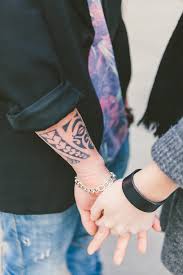 Double hand tattoos by dylan weber, an artist at atlnts studio in sydney, australia. Teenage Couple With Tattoo Holding Hands By Giorgio Magini