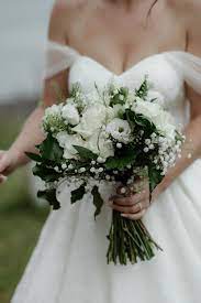 5 out of 5 stars. Hand Tied Bridal Bouquet In Cool Whites And Dark Green Designed By Justine Oban Bridal Bouquet Green White Wedding Flowers Bouquet White Rose Wedding Bouquet