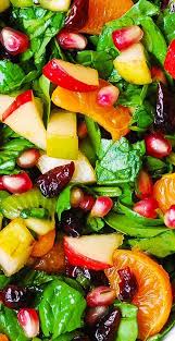 Holiday Spinach Salad With Apples Pears Mandarin Oranges Kiwi Fruit Cranberries And Pomegranate Winter Salad Recipes Delicious Salads Winter Salad
