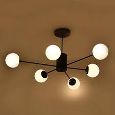 It features 6 sockets so it puts off plenty of light. Industrial Chandelier 6 Light Modern Style With Globe White Glass Shade In Black Beautifulhalo Com